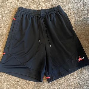 Jordan brand men’s size XXL black shorts with accent color.